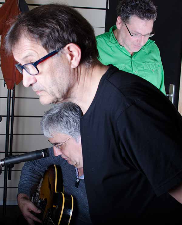 Drei Männer im Studio